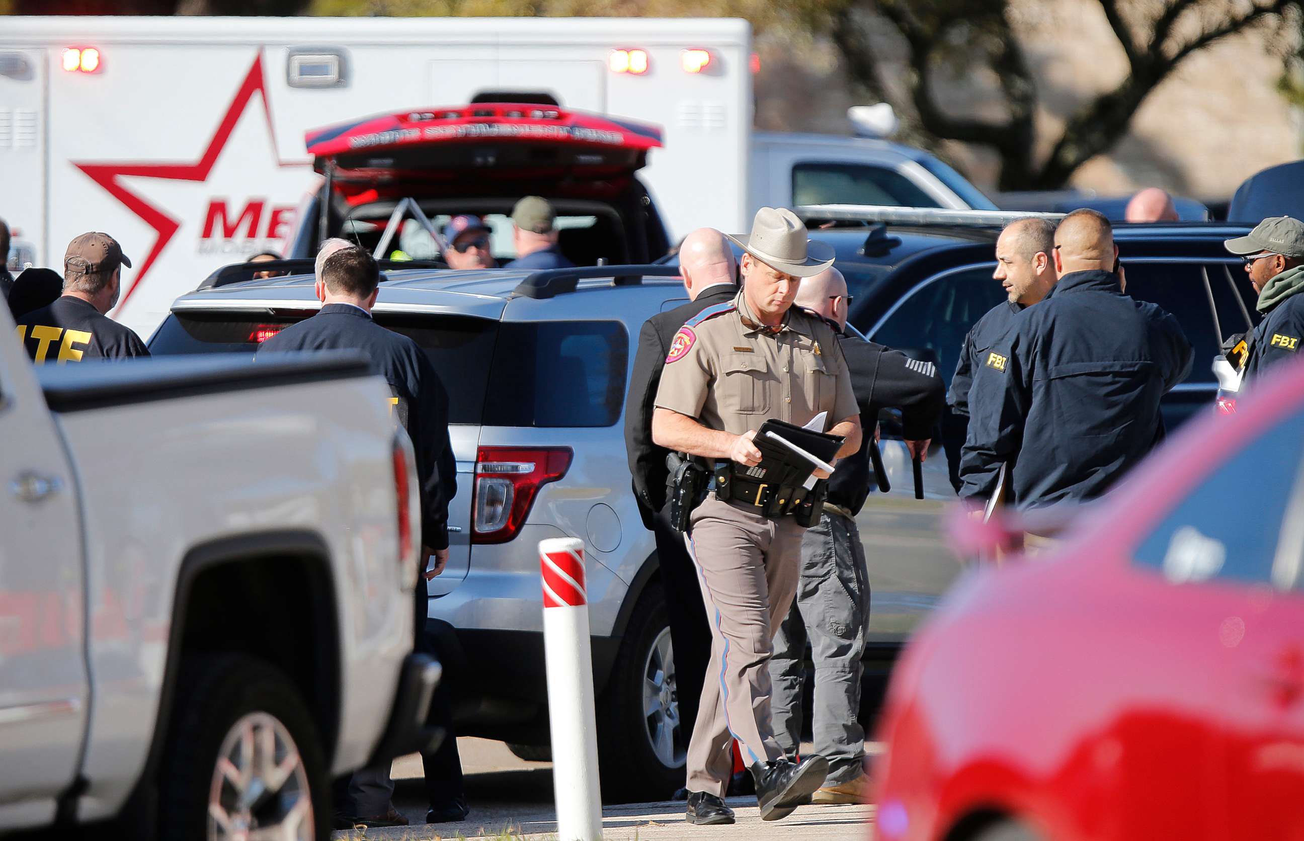 PHOTO: Authorities work the scene after a shooting took place during services at West Freeway Church of Christ, Dec. 29, 2019, in White Settlement, Texas.