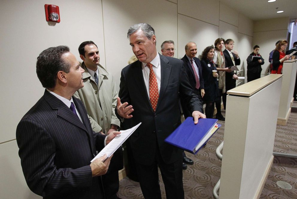 PHOTO: Sen. Sheldon Whitehouse, D-R.I., talks with Providence Mayor and Rep.-elect David Cicilline, D-R.I., left, during the Ocean State Consortium of Advanced Resources (OSCAR) conference at Brown University in Providence, R.I., Dec. 13, 2010. 