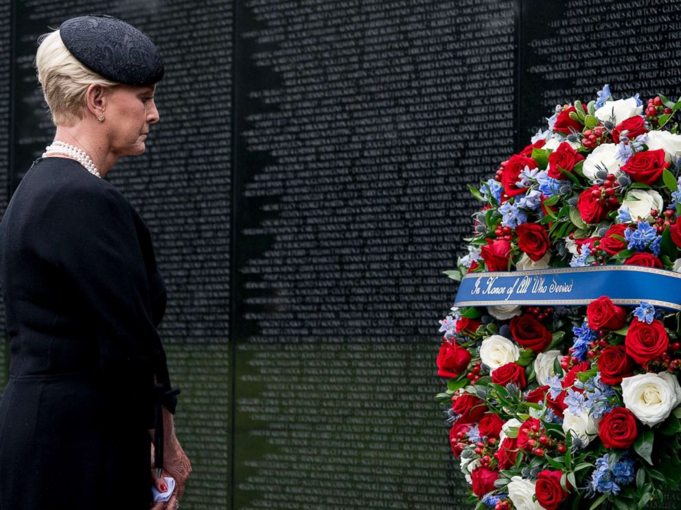 PHOTO: Cindy McCain lays a wreath at the Vietnam Veterans Memorial in Washington, Sept. 1, 2018, during a funeral procession for her husband, Sen. John McCain.