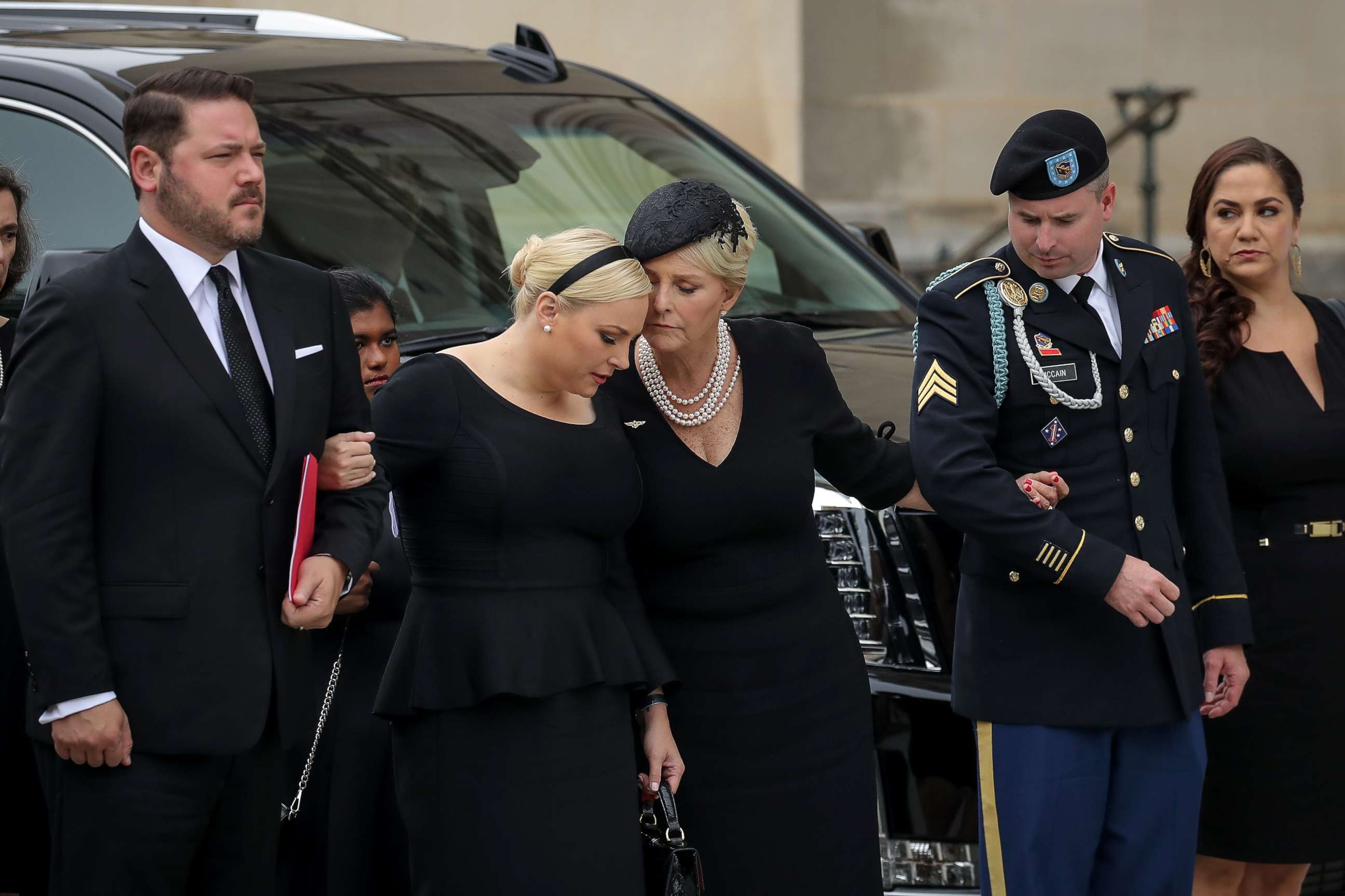 PHOTO: Meghan McCain and her mother Cindy McCain embrace as the casket of the late Senator John McCain arrives at the Washington National Cathedral for the funeral service for McCain, Sept. 1, 2018, in Washington.