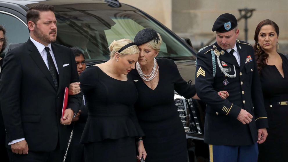 PHOTO: Meghan McCain and her mother Cindy McCain embrace as the casket of the late Senator John McCain arrives at the Washington National Cathedral for the funeral service for McCain, Sept. 1, 2018, in Washington.