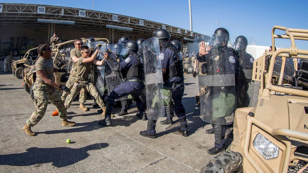 PHOTO: U.S. Soldiers with 93rd Military Police Battalion, Special Purpose Marine Air-Ground Task Force 7, simulate resistance during civil disturbance training with U.S. Customs and Border Protection (CBP) at the Otay Mesa Port of Entry, Dec. 16, 2018.