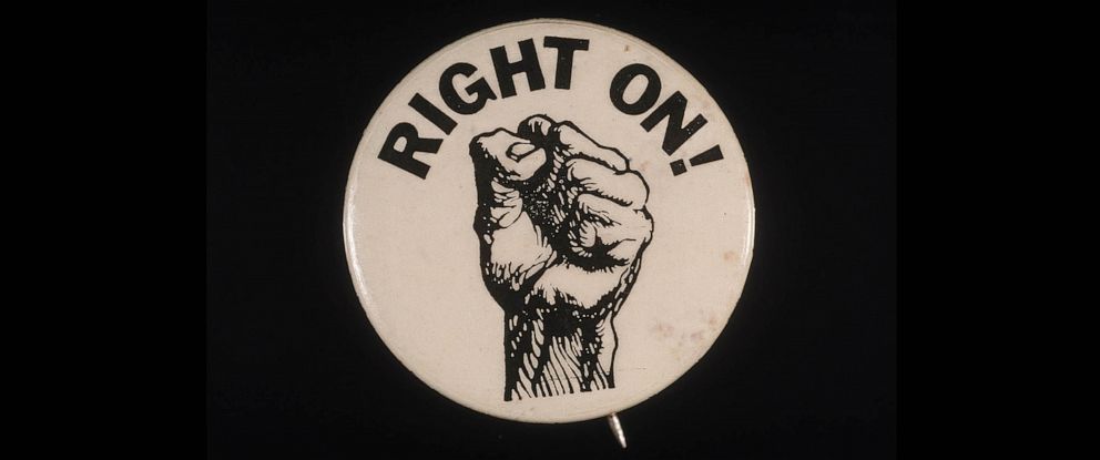 PHOTO: A 'Right On!' button, featuring an illustration of a clenched black fist to symbolize the Black Power movement, circa. early 1970s.