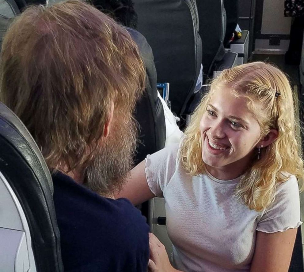 PHOTO: Clara Daly, 15, was traveling home from Boston to Los Angeles on a Alaska Airlines flight and volunteered to help a fellow passenger in need who is blind and deaf by signing into his hand.