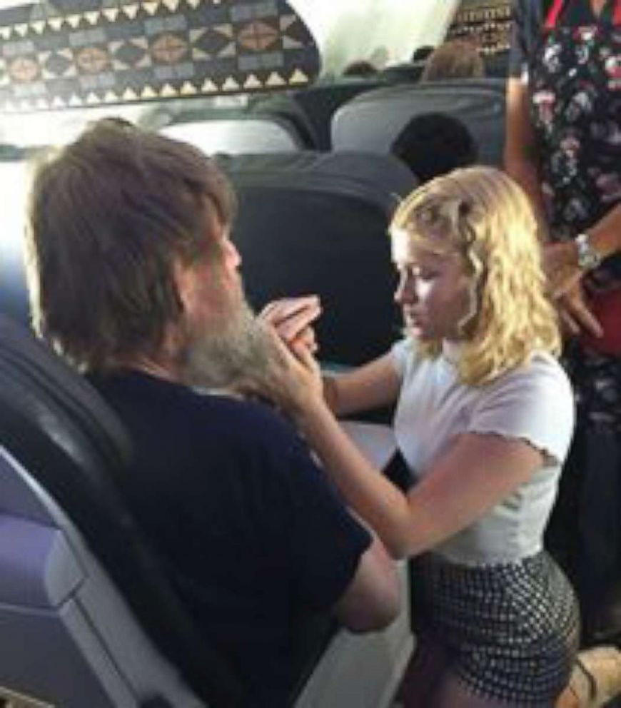 PHOTO: Clara Daly, 15, was traveling home from Boston to Los Angeles on a Alaska Airlines flight and volunteered to help a fellow passenger in need who is blind and deaf by signing into his hand.