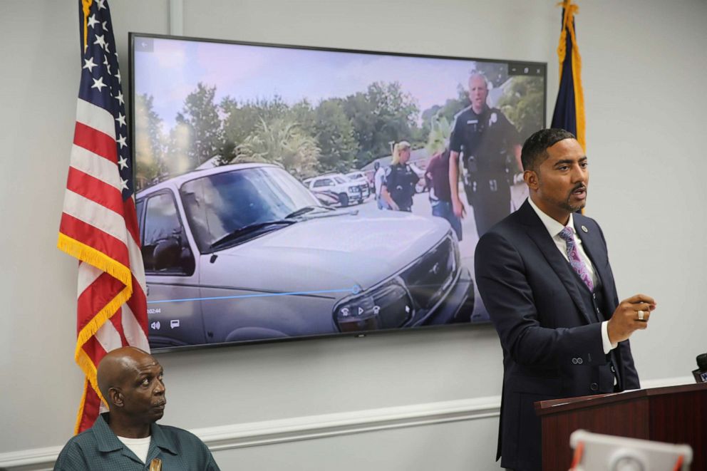 PHOTO: Attorney Justin Bamberg, right, speaks and his client Clarence Gailyard, left, listens, after Bamberg showed body camera video of an officer stomping Gailyard in the neck, at a news conference in Orangeburg, S.C., Aug. 3, 2021.