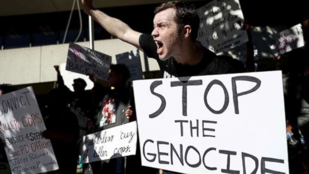 Black Lives Matter protesters stage a demonstration outside of office of Sacramento district attorney Anne Schubert on March 28, 2018, in Sacramento.