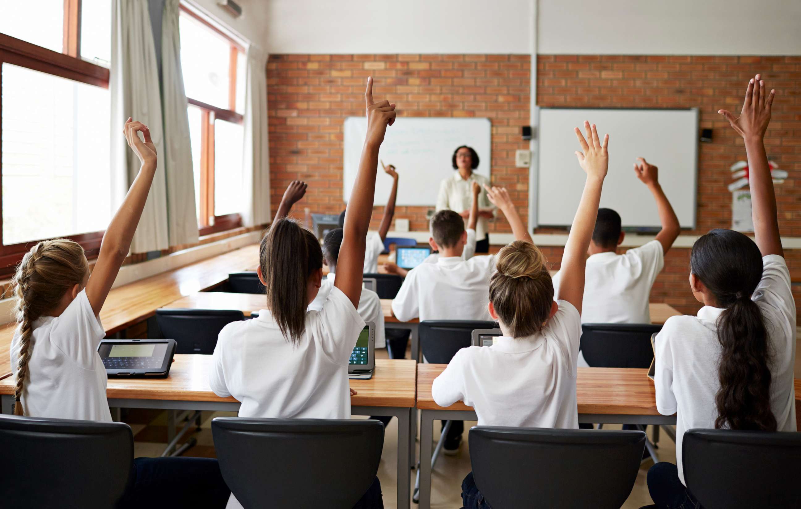 PHOTO: Stock photo of a teacher giving a lesson to a class.