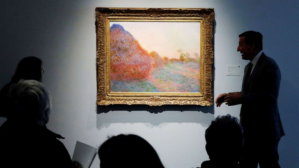 PHOTO: The painting by Claude Monet, part of the Haystacks "Les Meules" series is displayed at Sotheby's during a press preview of their upcoming impressionist and modern art sale in New York, May 3, 2019.