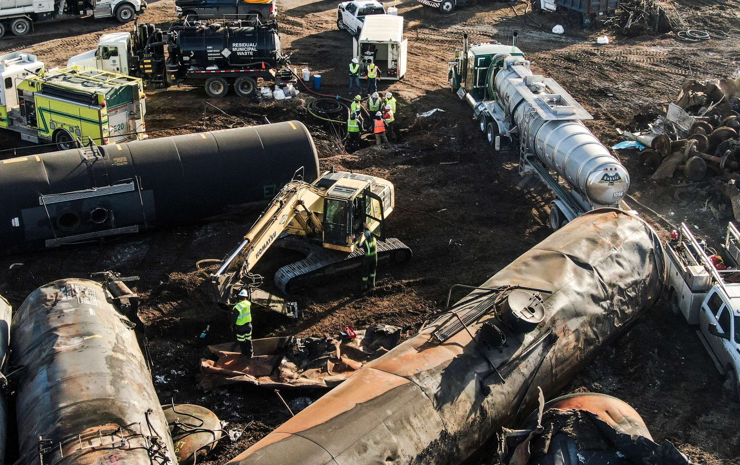 PHOTO: Workers and damaged tank cars during cleanup in the aftermath of a Norfolk Southern freight train derailment that has created concern by residents over the release of toxic chemicals in East Palestine, Ohio, Feb. 18, 2023.