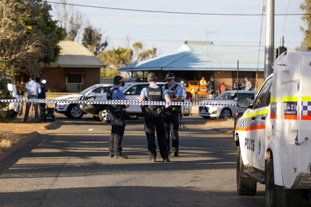 PHOTO: Police officers stand on patrol outside a house where four-year-old Cleo Smith was found, Nov. 3, 2021 in Carnarvon, Australia. 