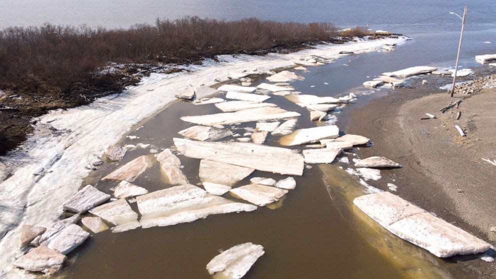 PHOTO: Melting ice beside severe erosion of the permafrost tundra at Bethel on the Yukon Delta in Alaska, April 15, 2019. Alaska has been warming twice as fast as the global average, with temperatures in February and March shattering records.