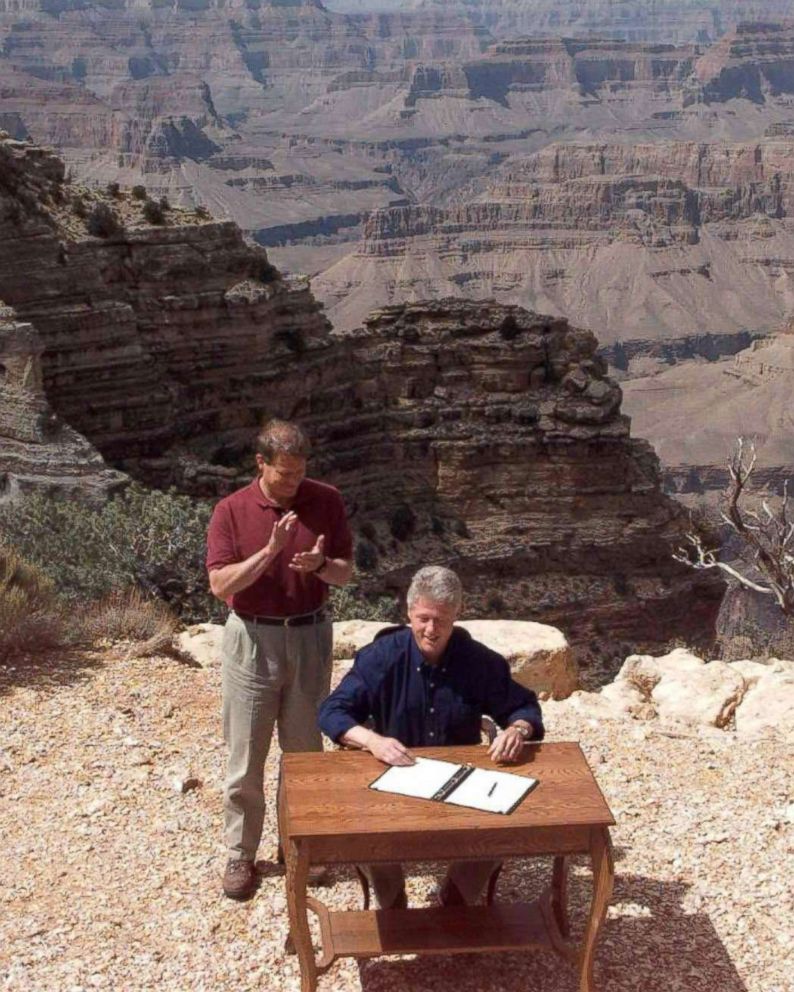 PHOTO: President Bill Clinton signs an order in Grand Canyon National Park in Arizona to designate a vast canyon-land in Utah, including Grand Escalante Staircase, a national monument, Sept. 16, 1996. Vice President Al Gore stands by his side.