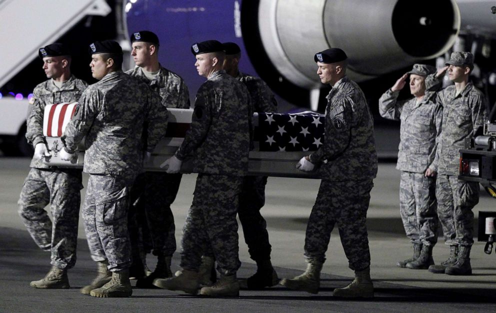 PHOTO: An Army carry team moves a transfer case containing the remains of Sgt. Clinton K. Ruiz, 22, at Dover Air Force Base, Del., Oct. 27, 2012.