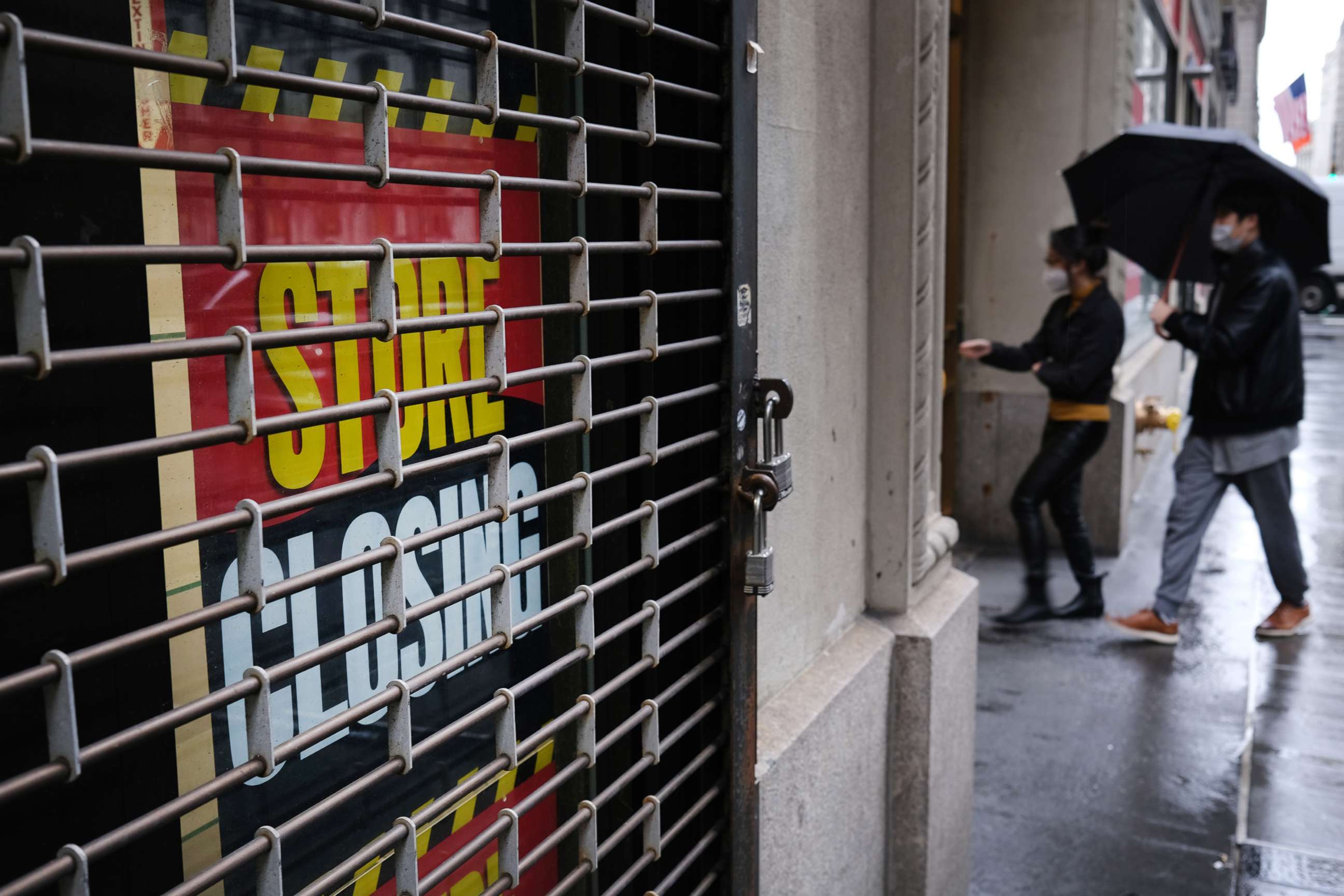 PHOTO: A store stands closed near Wall Street as the coronavirus keeps financial markets and businesses mostly closed on May 8, 2020 in New York City.