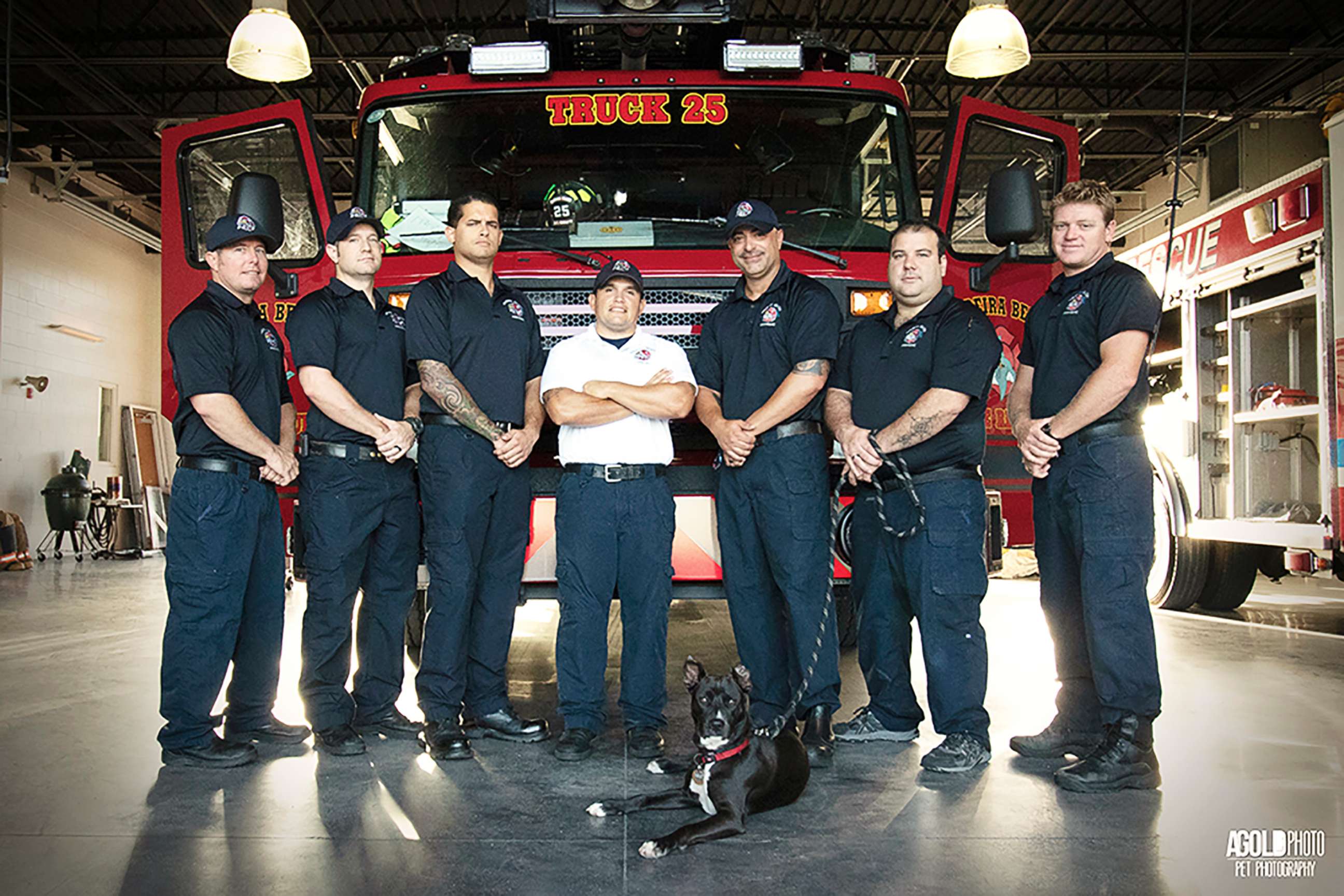 PHOTO: Clover is pictured with fire fighters at Madeira Beach Fire Station in Madeira Beach, Fla.