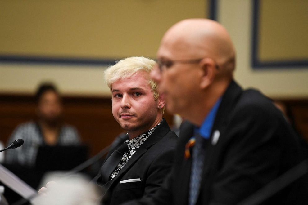 PHOTO: Michael Anderson, survivor of Club Q shooting, listens to Matthew Haynes, founding owner of Club Q make his statement during a House Committee on Oversight and Reform Hearing, Dec. 14, 2022, in Washington.