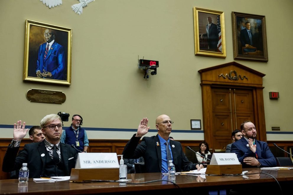 PHOTO: Michael Anderson, a survivor of the Club Q shooting, Matthew Haynes, the owner of Club Q, and James Slaugh another survivor, are sworn in during a House Oversight Committee hearing at the Rayburn House Office Building, Dec. 14, 2022, in Washington.