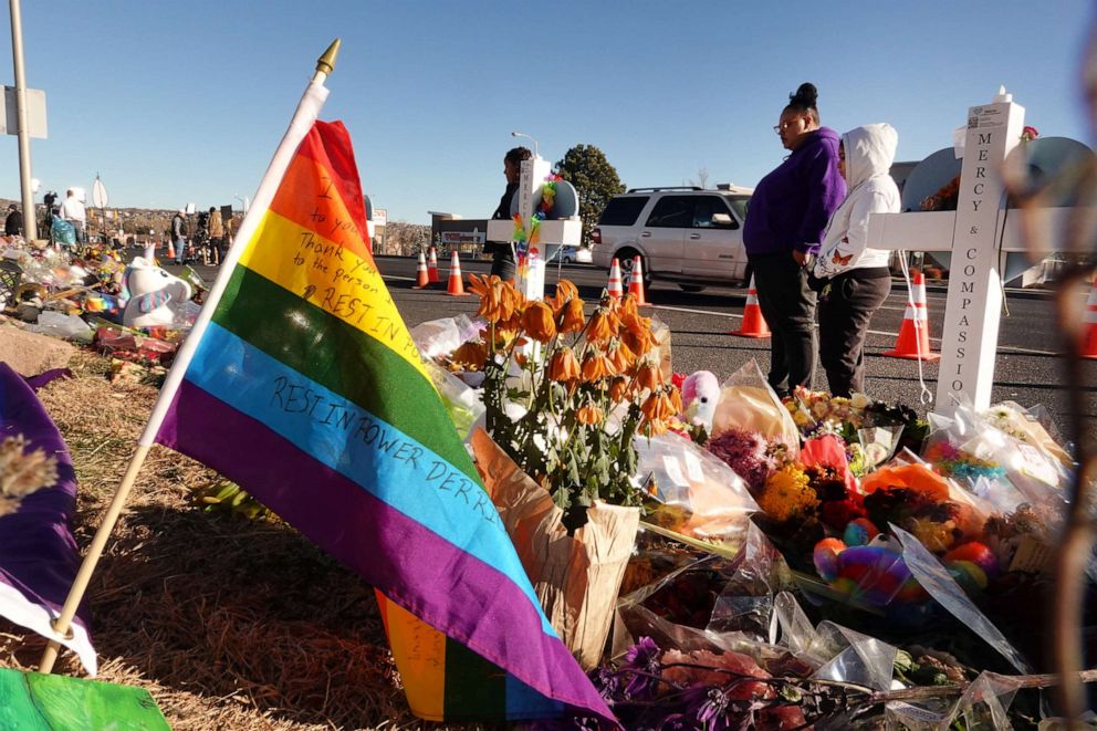 PHOTO: People visit a memorial near the Club Q nightclub, Nov. 22, 2022, in Colorado Springs, Colo.