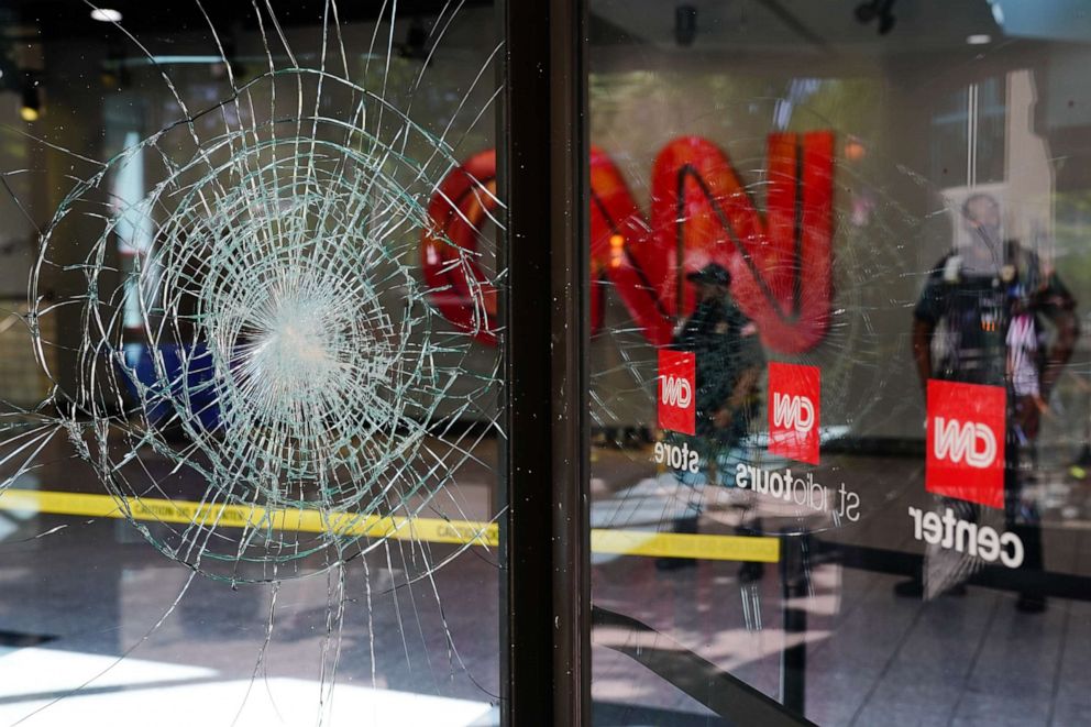 PHOTO: Damage is seen to CNN Center following an overnight demonstration over the Minneapolis death of George Floyd while in police custody on May 30, 2020 in Atlanta.