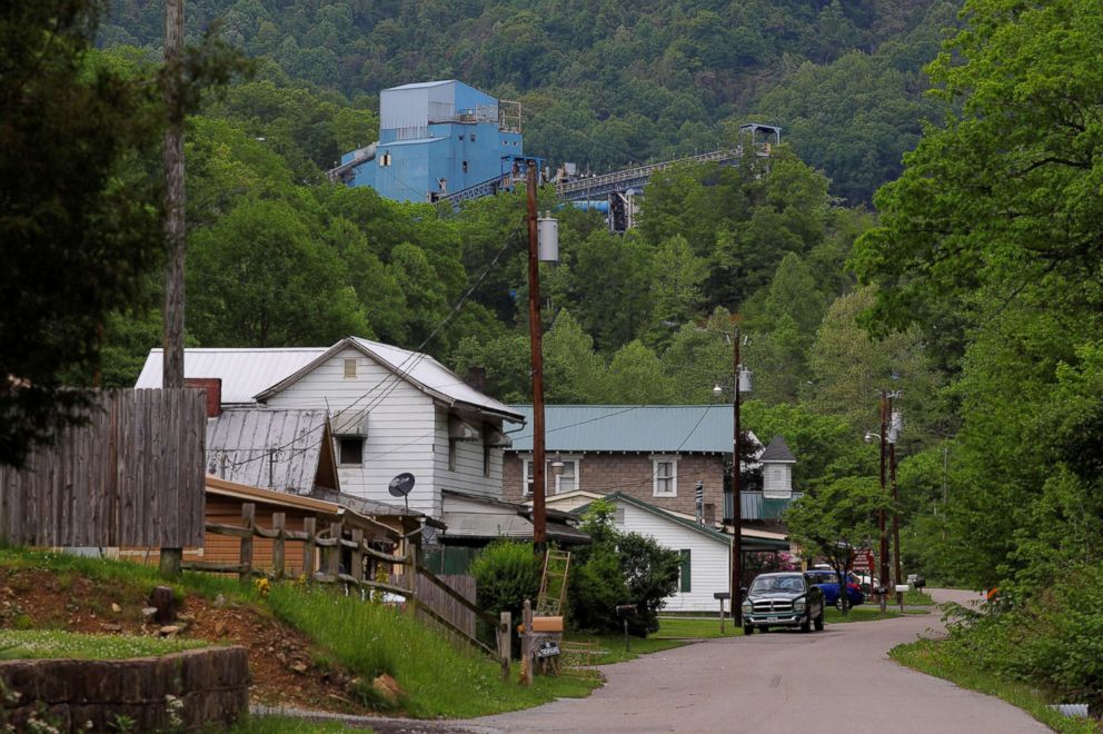 PHOTO: Coal camp company houses sit below the Lone Mountain Processing coal mine in St. Charles, Va., May 18, 2018.