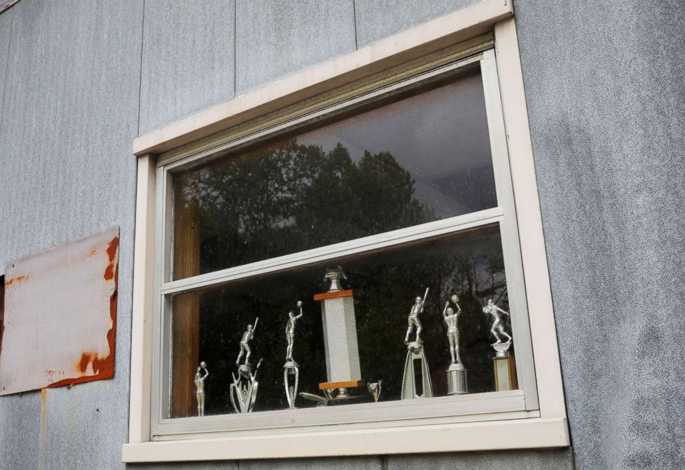 PHOTO: Sports trophies remain in the window of the abandoned facilities of the Roda coal mine owned by Westmoreland in Appalachia, Va., May 18, 2018.