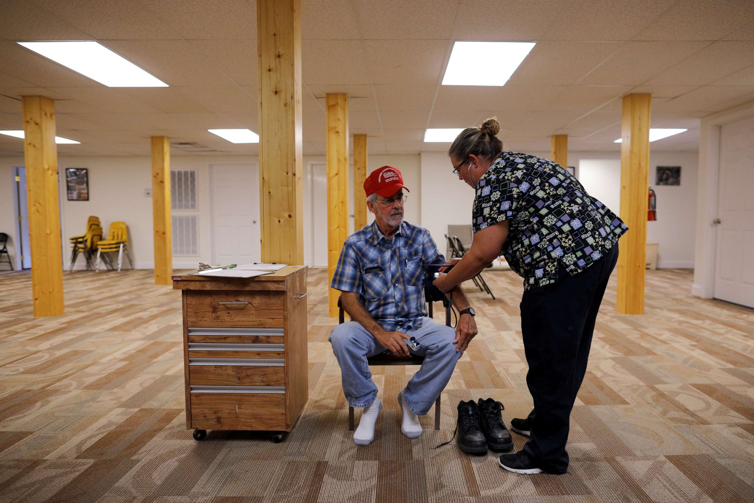 PHOTO: Nurse Melissa Muse checks the blood pressure of retired coal miner James Marcum, who has complicated black lung disease, during an exam at Stone Mountain Health Services in St. Charles, Va., May 18, 2018.