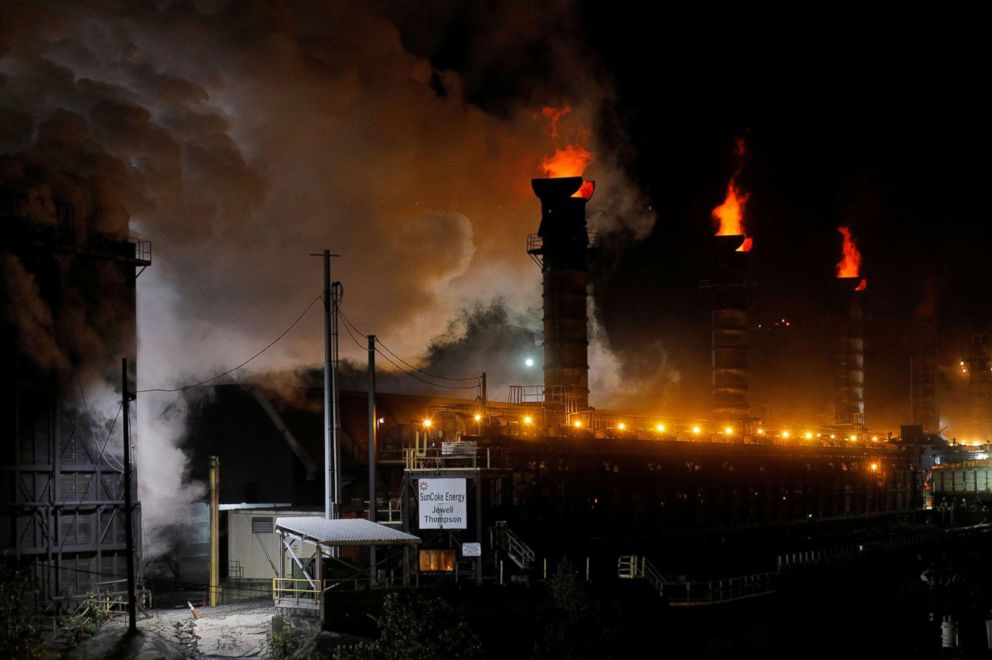 PHOTO: Flames, steam and exhaust rise from the Suncoke Jewell coke making plant, which burns coal to make coke which is used to make steel, in Oakwood, Va., May 19, 2018.