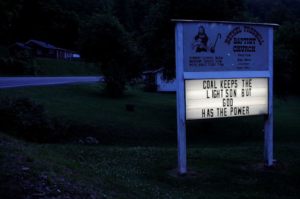 PHOTO: The sign outside the Bethel Freewill Baptist Church reads "Coal Keeps the Lights On But God Has the Power" in Virgie, Ky., May 18, 2018.