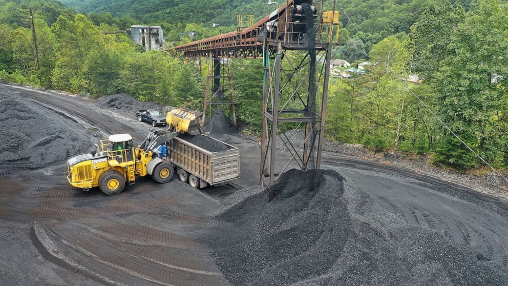 PHOTO: In this August 26, 2019, file photo, coal is loaded onto a truck at a mine on near Cumberland, Kentucky.