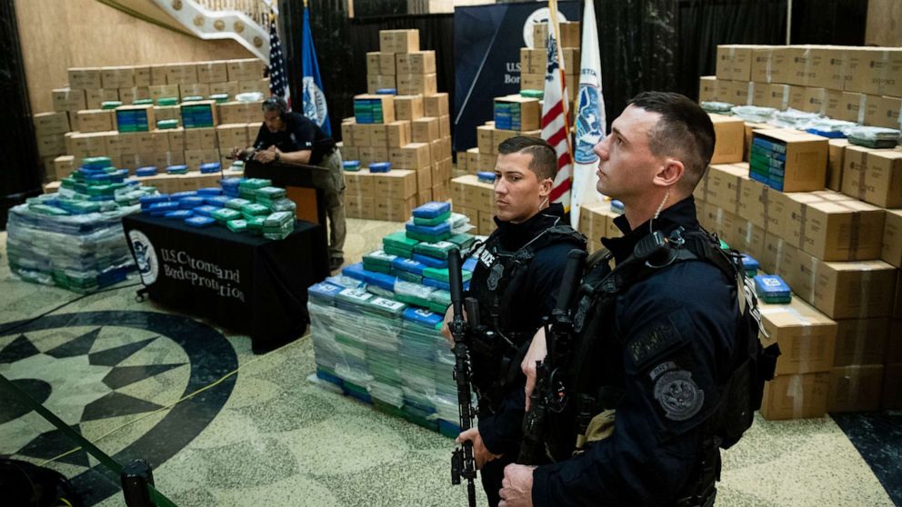 PHOTO: Officers stand guard over a fraction of the cocaine sized from a ship at a Philadelphia port is seen ahead of a news conference at the U.S. Custom House in Philadelphia, June 21, 2019.