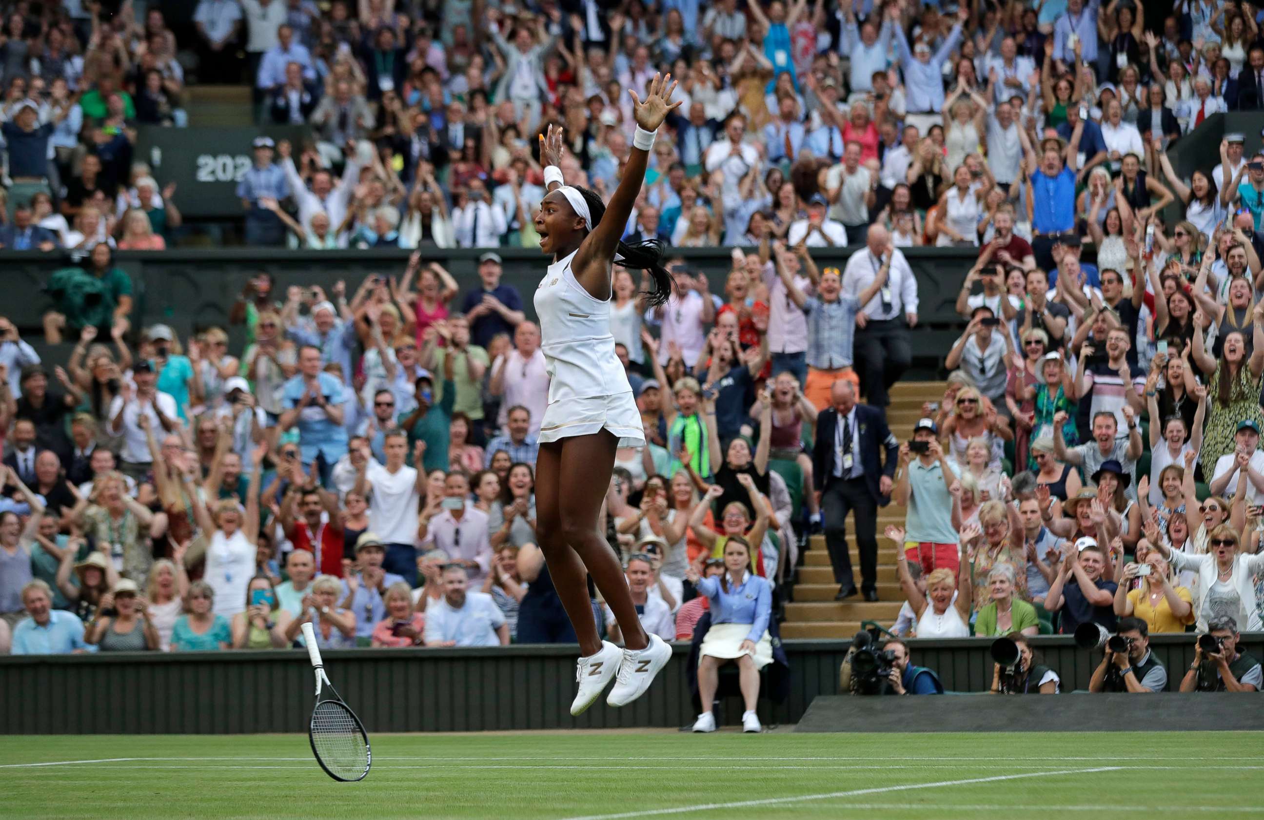 PHOTO: United States' Cori "Coco" Gauff celebrates after beating Slovenia's Polona Hercog in a Women's singles match during day five of the Wimbledon Tennis Championships in London, July 5, 2019.