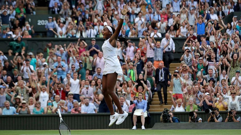 PHOTO: United States' Cori "Coco" Gauff celebrates after beating Slovenia's Polona Hercog in a Women's singles match during day five of the Wimbledon Tennis Championships in London, July 5, 2019.