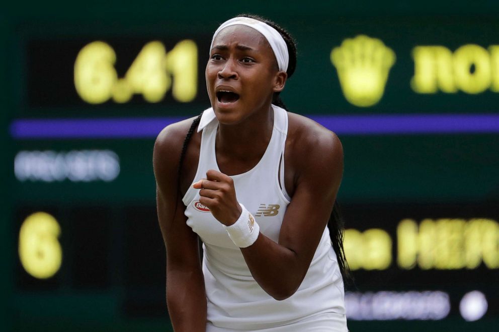 PHOTO: United States' Cori "Coco" Gauff reacts after winning a point against Slovenia's Polona Hercog in a Women's singles match during day five of the Wimbledon Tennis Championships in London, July 5, 2019. 