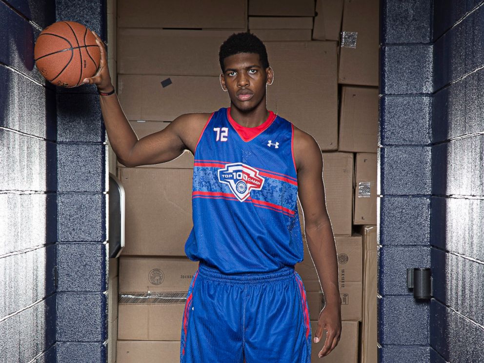 PHOTO: Cody Riley #72 in blue poses for a portrait during the National Basketball Players Association Top 100 Camp, June 19, 2014, at John Paul Jones Arena in Charlottesville, Virginia.