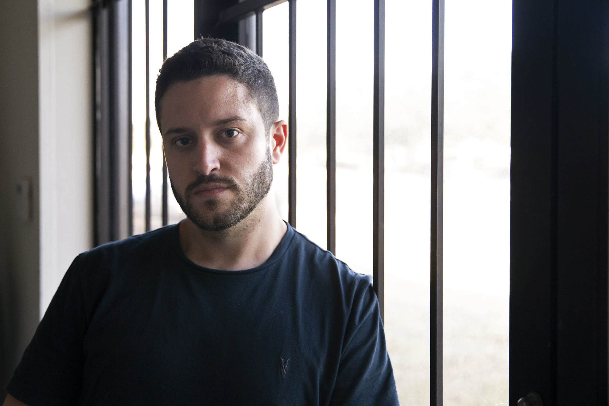PHOTO: Cody Wilson poses for a portrait in the Defense Distributed office in Austin, Texas, Aug. 7, 2018.