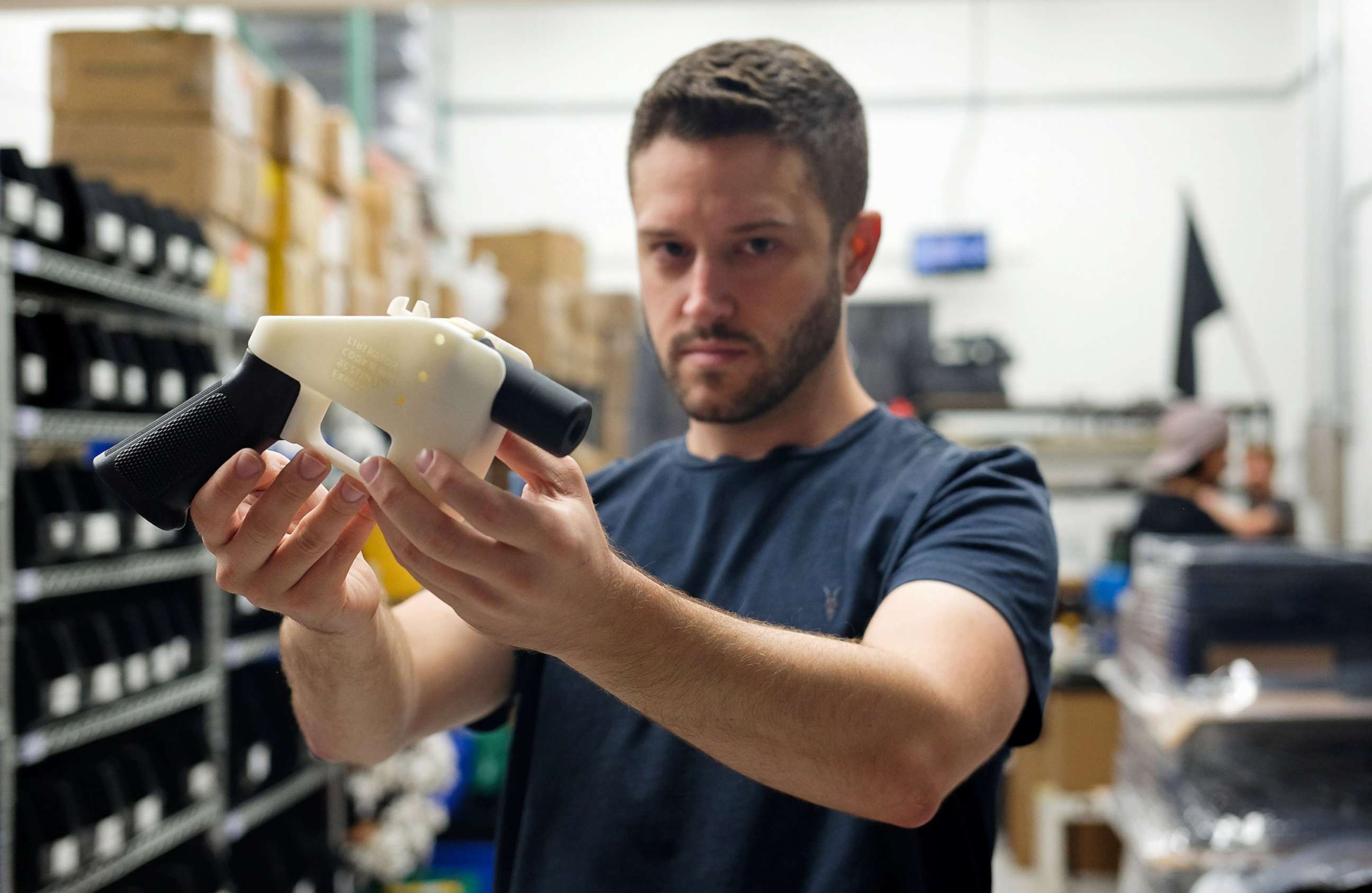 PHOTO: Cody Wilson, owner of Defense Distributed company, holds a 3D printed gun, called the "Liberator," in his factory in Austin, Texas, Aug. 1, 2018.