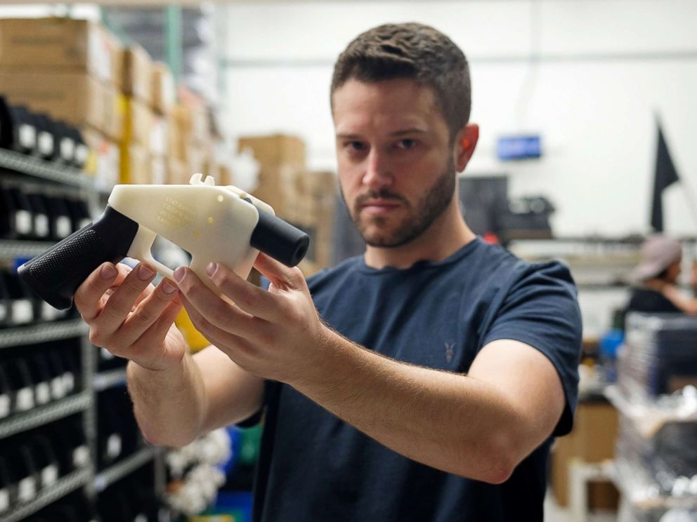 PHOTO: Cody Wilson, owner of Defense Distributed company, holds a 3D printed gun, called the Liberator, in his factory in Austin, Texas, Aug. 1, 2018.