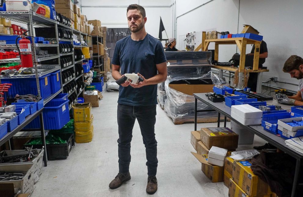 PHOTO: Cody Wilson, owner of Defense Distributed company, holds a 3D printed gun, called the "Liberator," in his factory in Austin, Texas, Aug. 1, 2018.