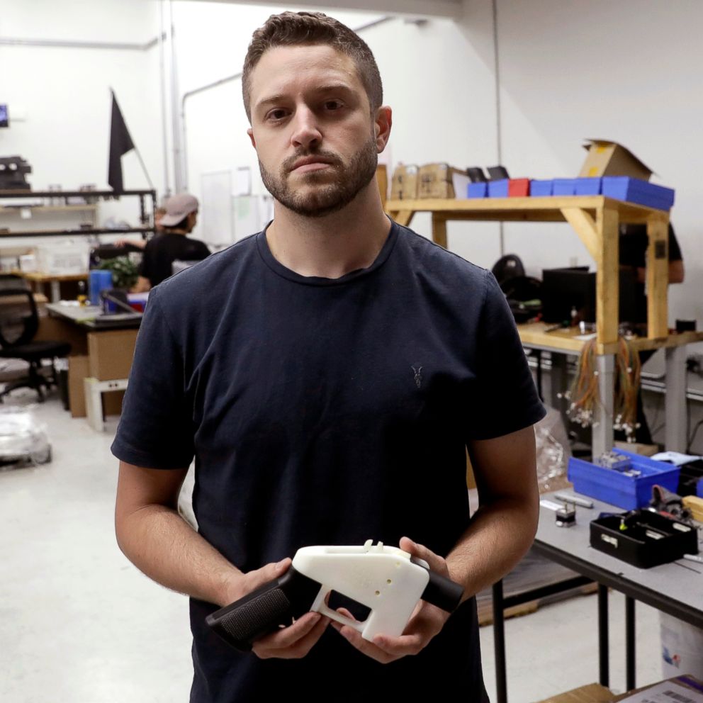 PHOTO: Cody Wilson, owner of Defense Distributed company, holds a 3D-printed gun called the "Liberator" at his shop, in Austin, Texas, Aug. 1, 2018.