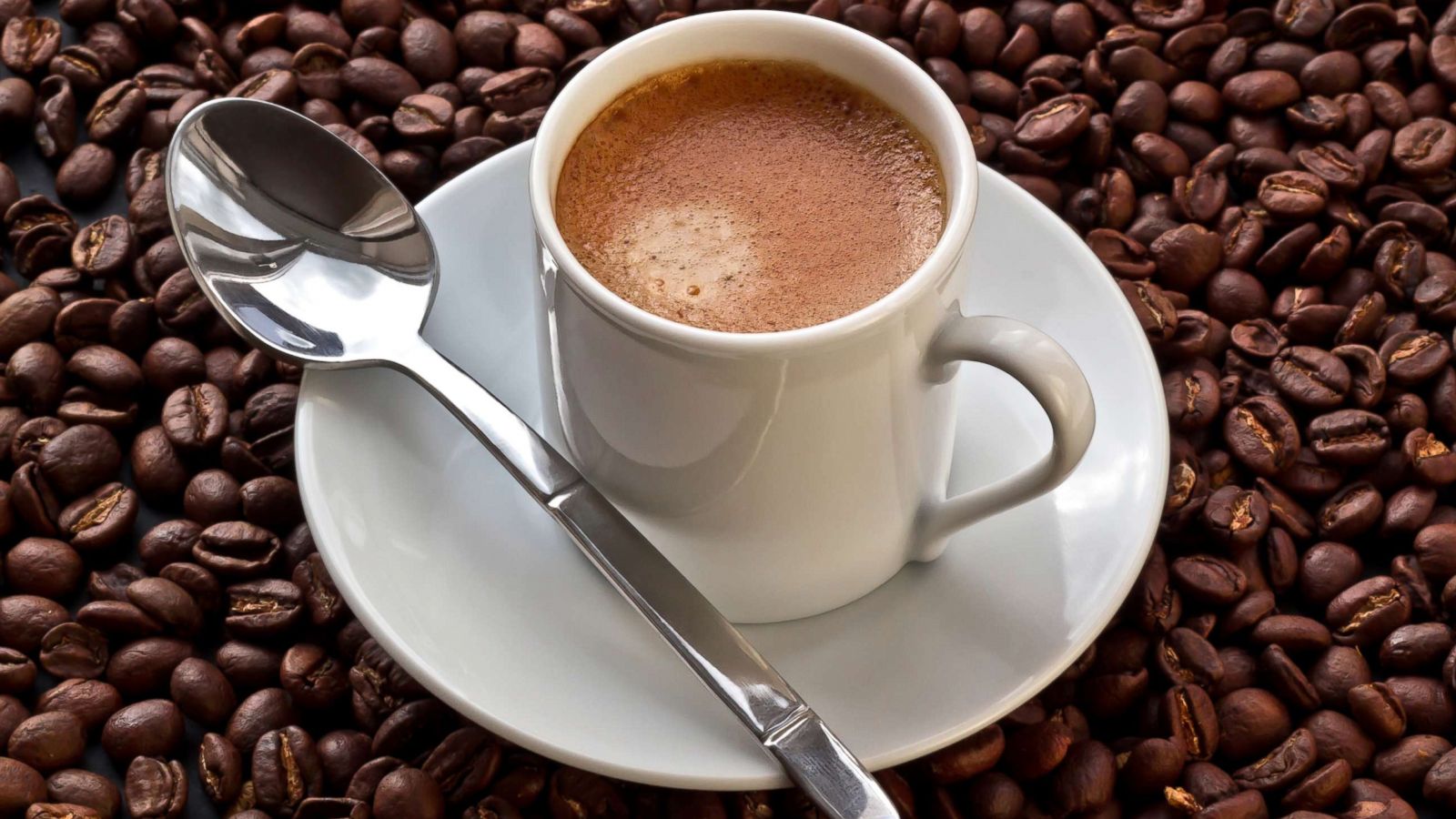 PHOTO: A cup of coffee is pictured on coffee beans in this undated stock photo.