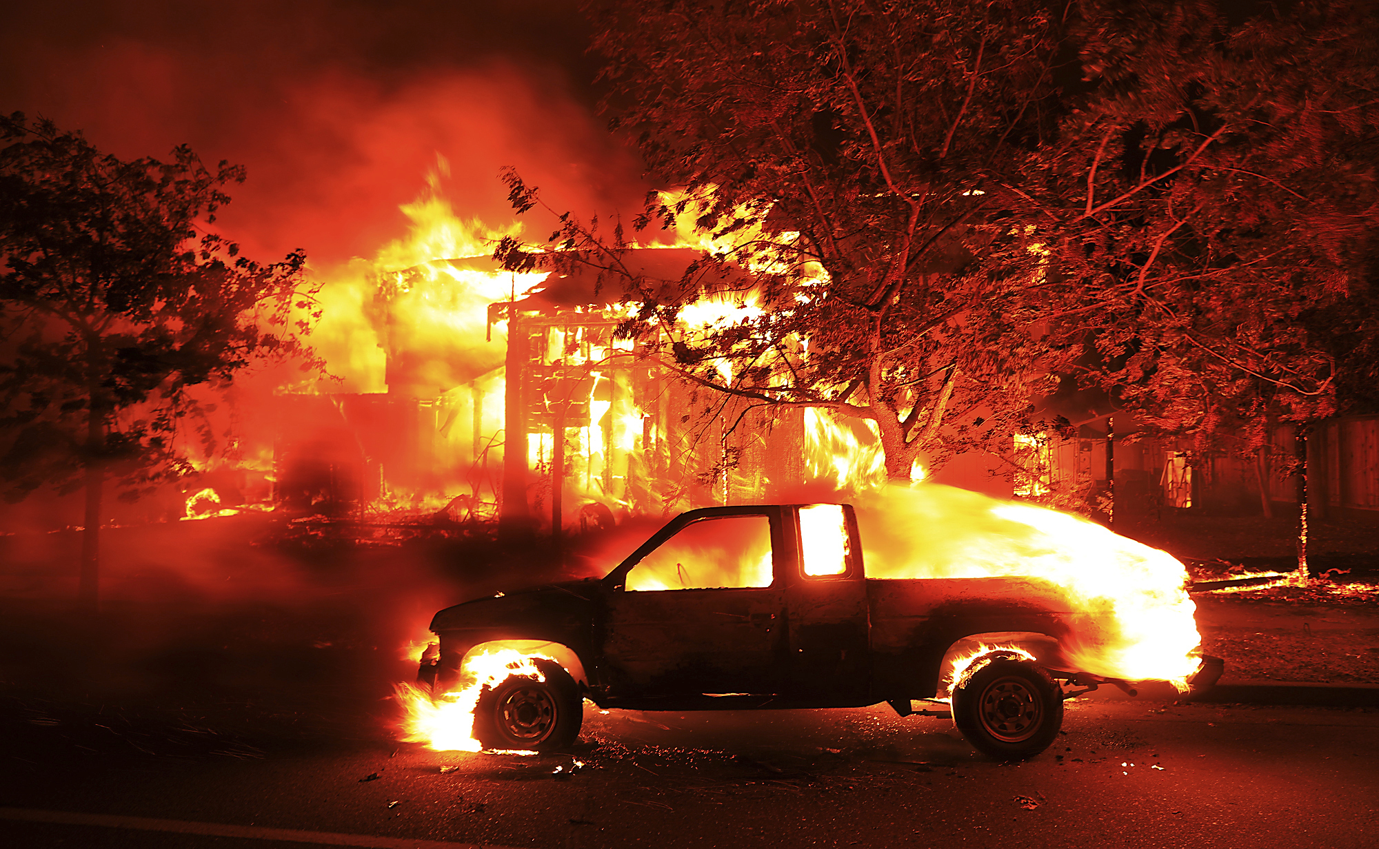PHOTO: Coffey Park homes burn early Monday Oct. 9, 2017 in Santa Rosa, Calif.