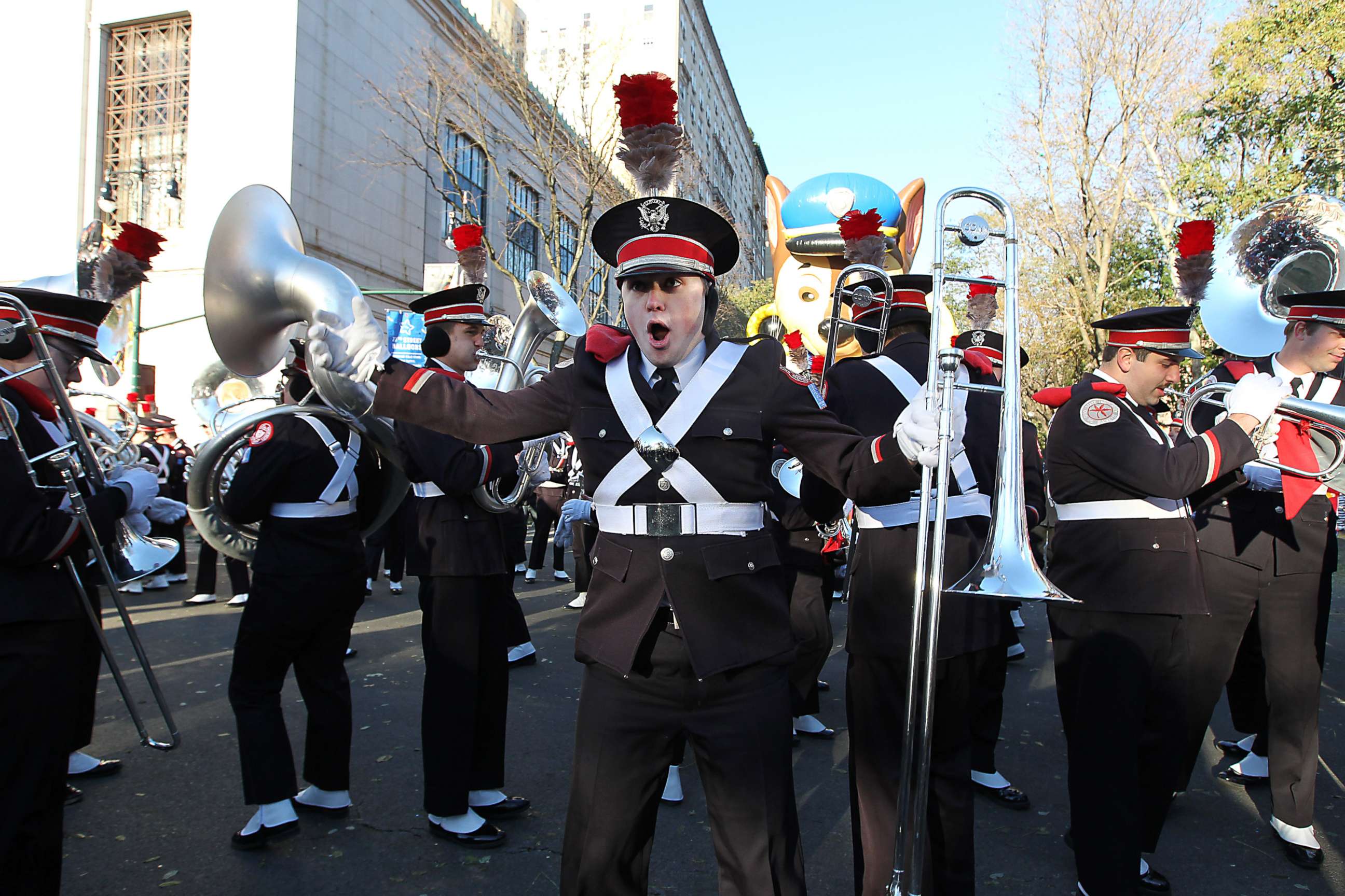 PHOTO: Macy's Thanksgiving Day Parade participants try to warm up while waiting in frigid temperatures in New York, Nov. 22, 2018.