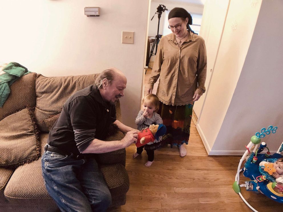 PHOTO: Jim Coleman, his daughter Caitlan, and Caitlan's daughter Grace enjoy a teddy bear given by ABC News' James Meek to Grace, who was the last of Caitlin's three children to be born during her five years in captivity.