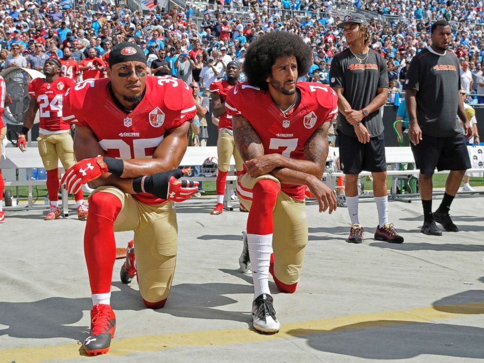 PHOTO: San Francisco 49ers Colin Kaepernick (7) and Eric Reid (35) kneel during the national anthem before an NFL football game against the Carolina Panthers, in Charlotte, N.C., Sept. 18, 2016.