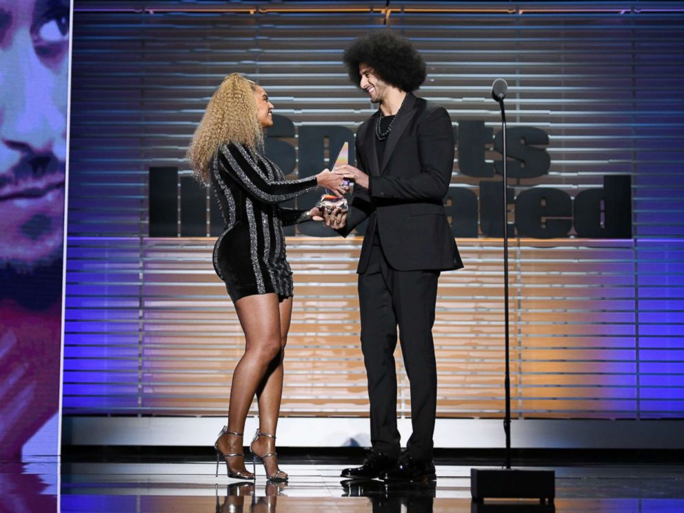 PHOTO: Colin Kaepernick receives the SI Muhammad Ali Legacy Award from Beyonce during Sports Illustrated Sportsperson of the Year Show on Dec., 5, 2017, in New York City.  