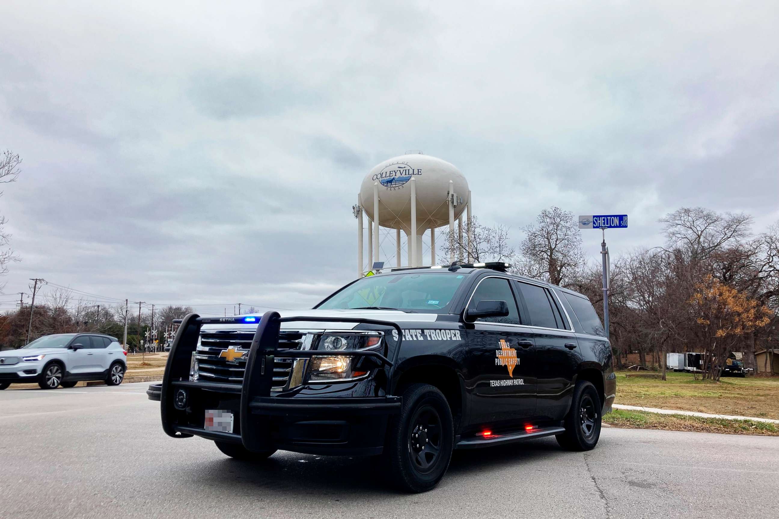 PHOTO: A Texas state trooper blocks traffic on a road leading to a Colleyville, Texas, synagogue where a man apparently took hostages, Jan. 15, 2022. 