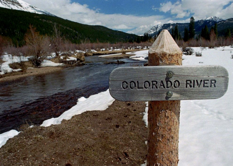 PHOTO: In this May 1, 1997 file photo a sign marks the Colorado River as it flows past the Never Summer Mountains in Rocky Mountain National Park near the town of Grand Lake, Colo.