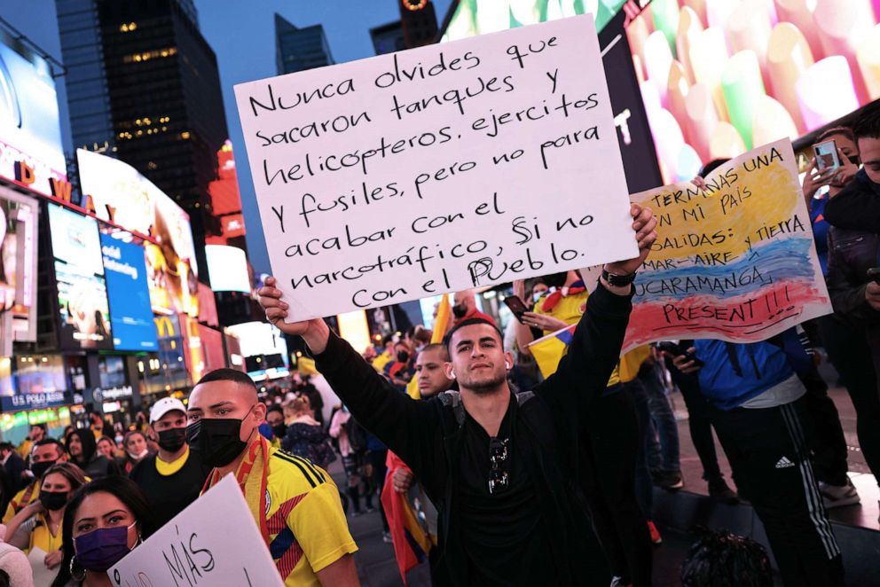 PHOTO: People rally in support of Colombian protestors in Times Square, May 6, 2021, in New York City.
