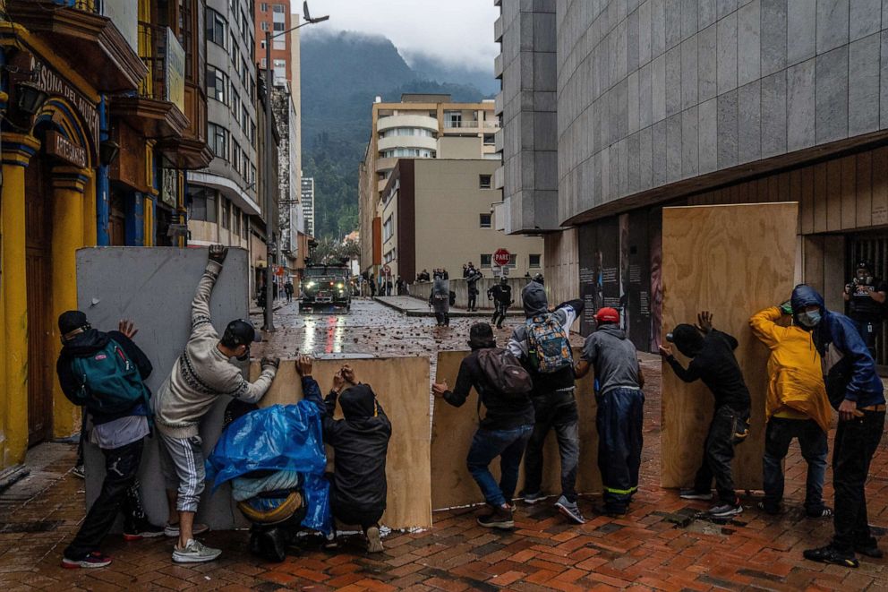 PHOTO: Protesters use plywood as shields in Bogota, Colombia, during demonstrations against the Colombian government, May 5, 2021.